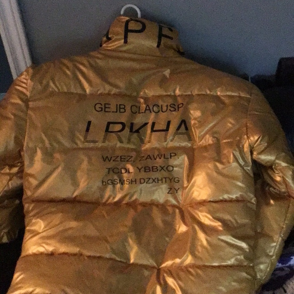 Xl medium brand puffer. Yellow and black